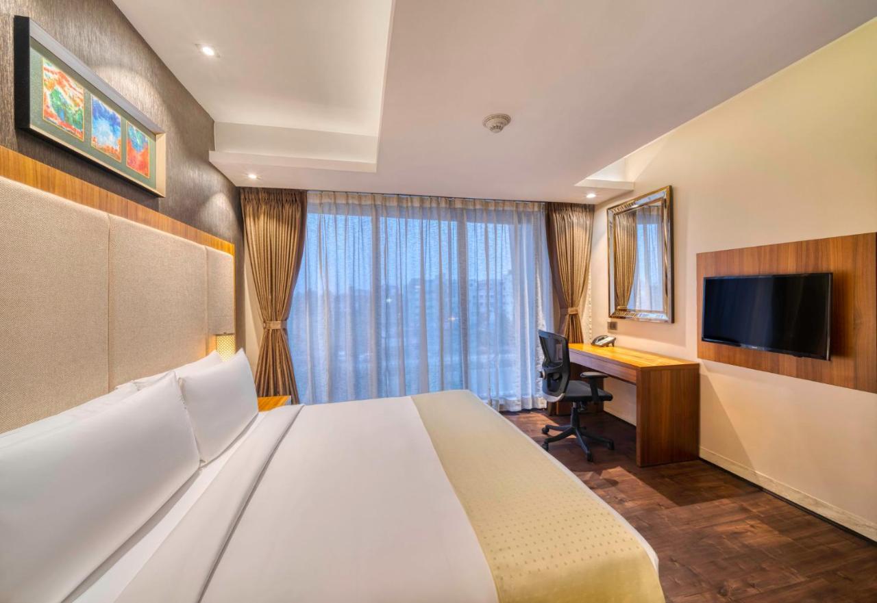 Holiday Inn Kolkata Airport By Ihg Exteriör bild A room at the hotel